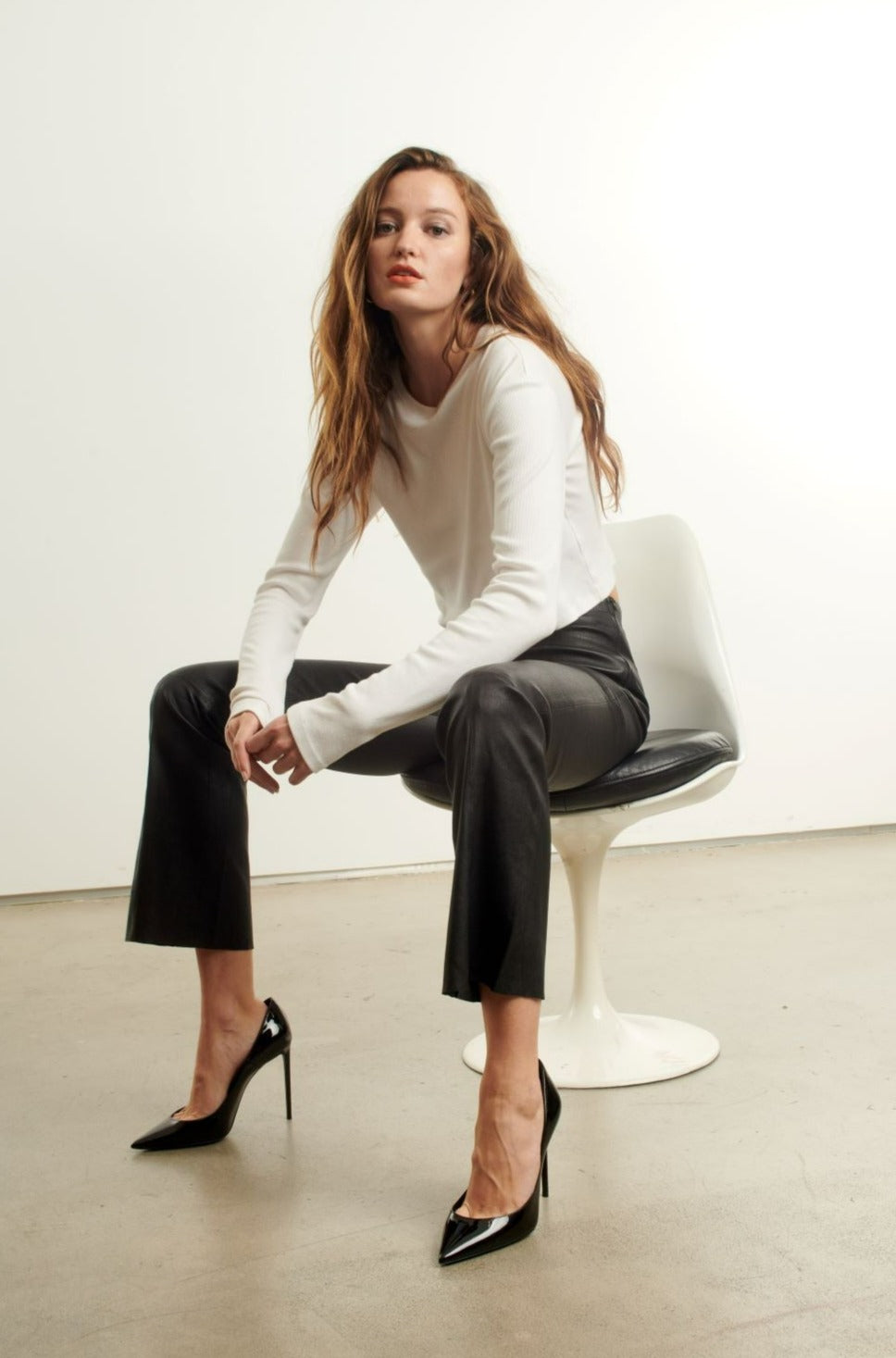 BLACK LEATHER ANKLE FLARE PANTS WITH PRINCESS SEAMS