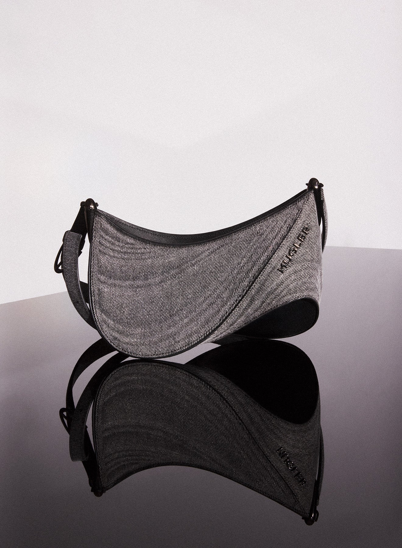 WASHED DENIM AND LEATHER BAG