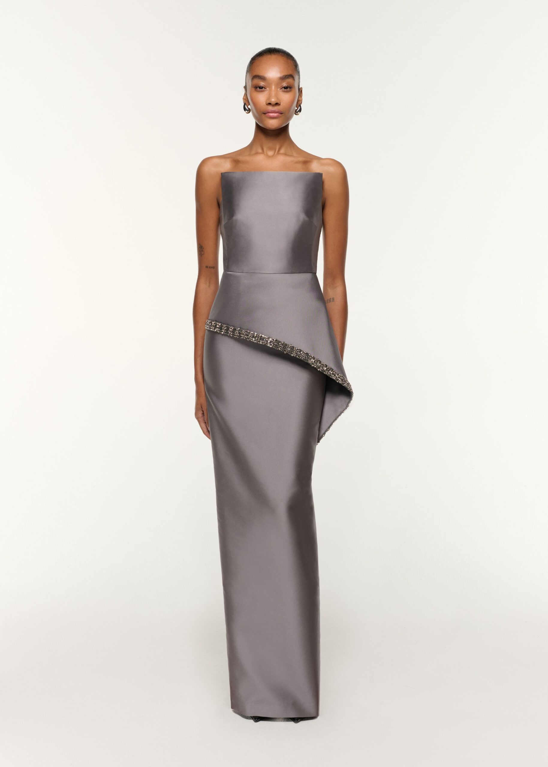 TAFETTA PEPLUM GOWN WITH CRYSTAL TRIMMING